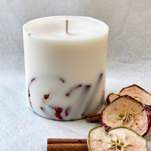 Eco friendly and natural soy wax candle with a mix of cinnamon, clove, apple, tangerine and orange scents.